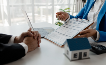 house-insurance-paperwork-a-realtor-is-explaining-2023-12-21-05-41-46-utc 1